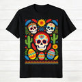Vibrant Day of the Dead and Easter TShirt Featuring Sugar Skulls Easter Eggs and Cacti Ideal Holiday Wear for Both Genders